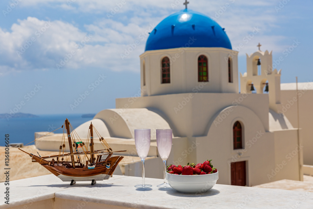Model of the frigate in the background architecture of Santorini