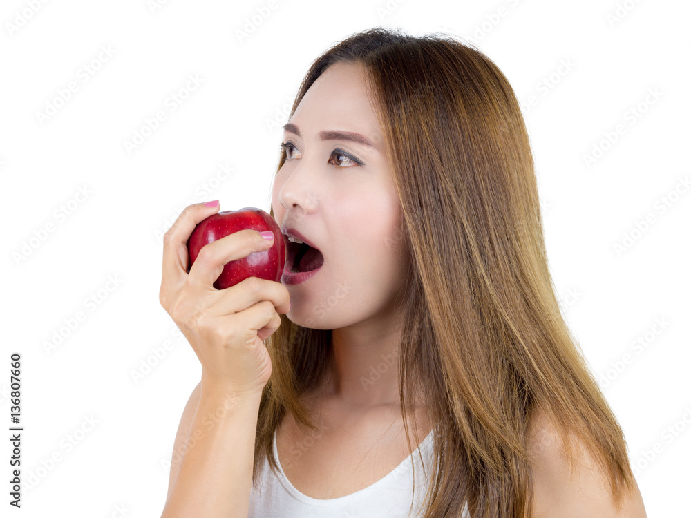 Asian Woman wearing in white shirt And eat Apple, isolated on white background. Healthy Food concept. Asian Woman wearing in white shirt And eat Apple, isolated on white background. Healthy Food concept.