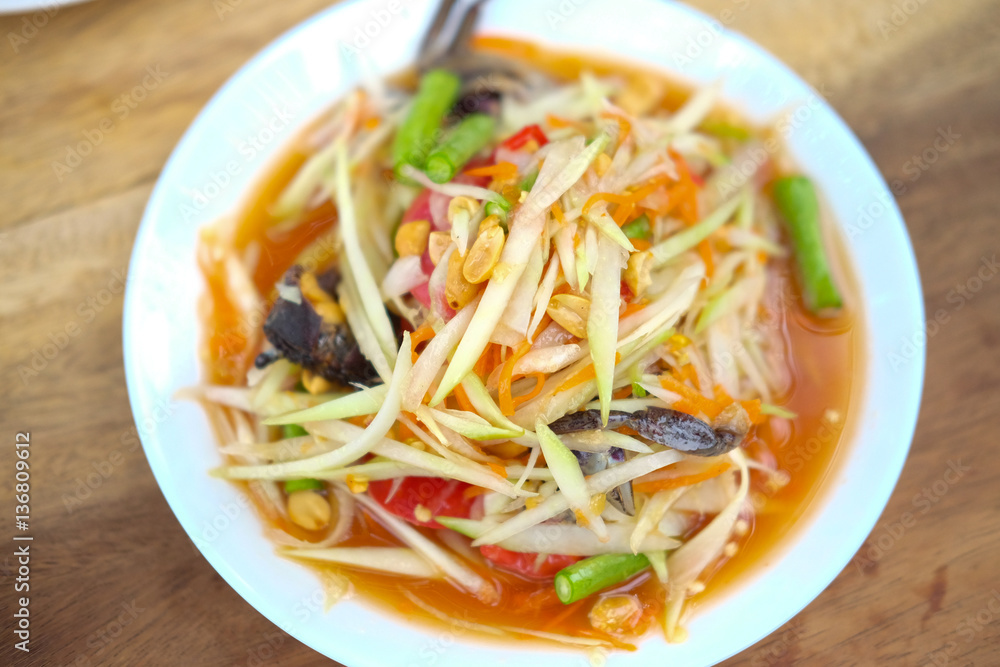 Papaya salad (papaya pok pok) top view Papaya salad (papaya pok pok) top view