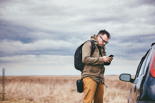 Man using smart phone outdoor