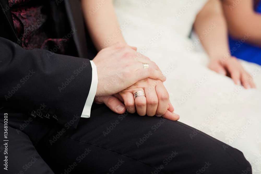 Obraz premium beautiful wedding rings of bride and groom