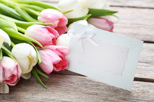 Fototapeta Naklejka Na Ścianę i Meble -  Bouquet of tulips on grey wooden table