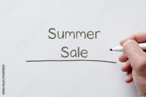 Summer sale written on whiteboard