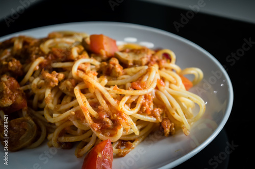closeup homemade spagetti with italian red sauce on plate