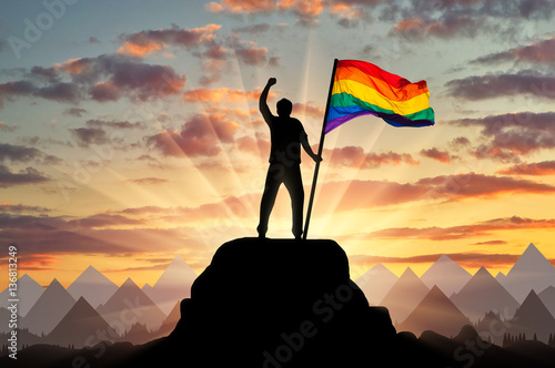 Silhouette with the gay rainbow flag