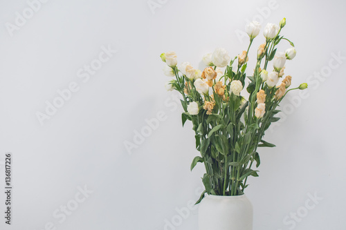 Decoration white rose flower in white jar