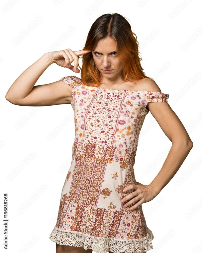 Pretty woman with orange hair making crazy gesture Pretty woman with orange hair making crazy gesture