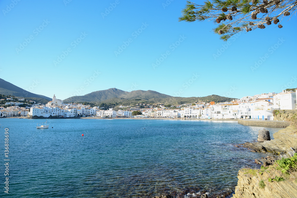 cityscape of Dali famous landmark spanish village Cadaques port on blue mediterranean sea sunny day