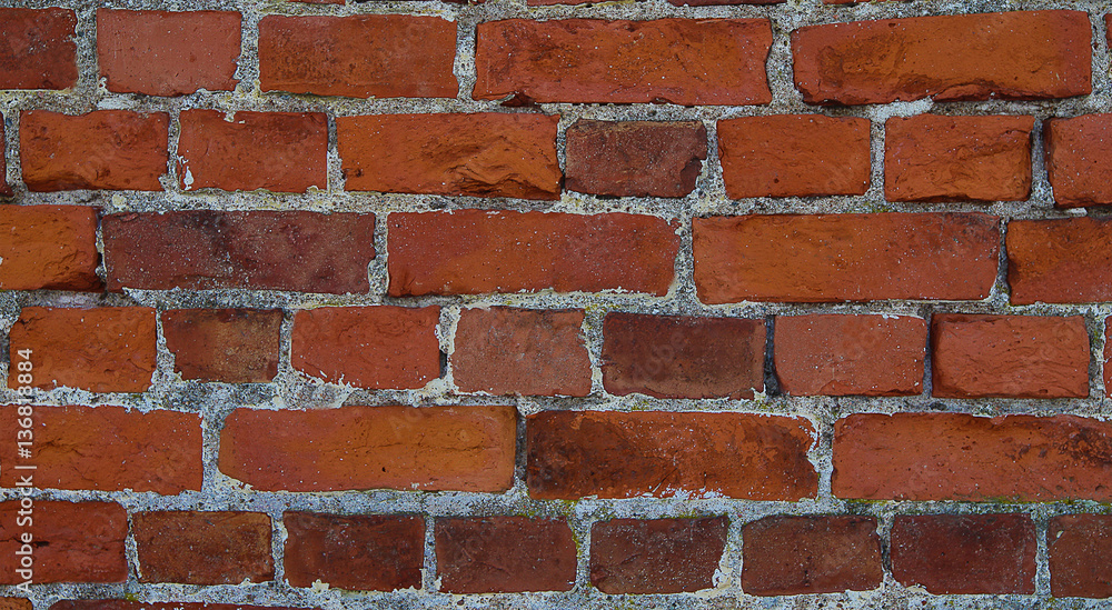 Fototapeta premium old masonry of orange rectangular red brick