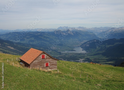 Summer day on mount Rigi. View of lake Lauerzersee and mount Mythen.