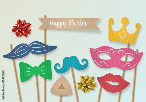 Purim holiday concept with cardboard carnival mask, mustache and