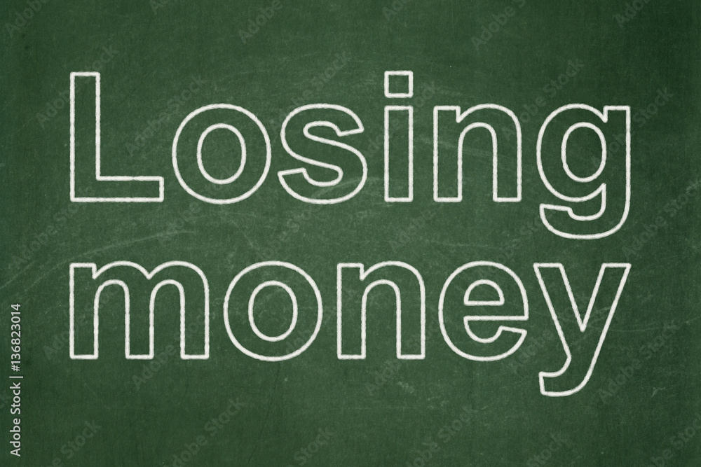 Obraz premium Money concept: Losing Money on chalkboard background