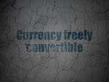Banking concept: Currency freely Convertible on grunge wall background