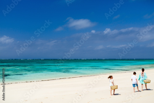 Mother and kids at tropical beach © BlueOrange Studio