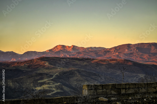 Beautiful landscape in the mountains with the sun at dawn. Mountains at the sunset time. Azerbaijan, Big Caucasus