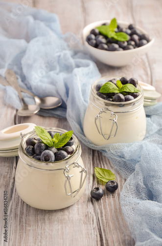 Natural homemade yogurt with blueberry and mint, selective focus