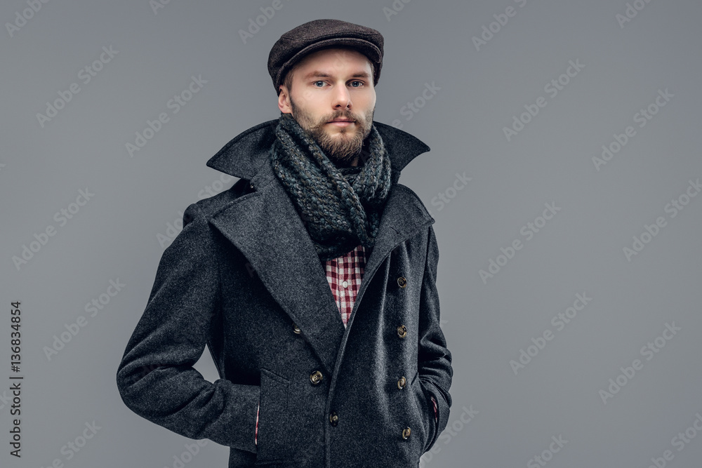 A man dressed in agrey jacket. A man dressed in agrey jacket.