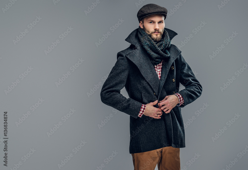 A man dressed in agrey jacket. A man dressed in agrey jacket.