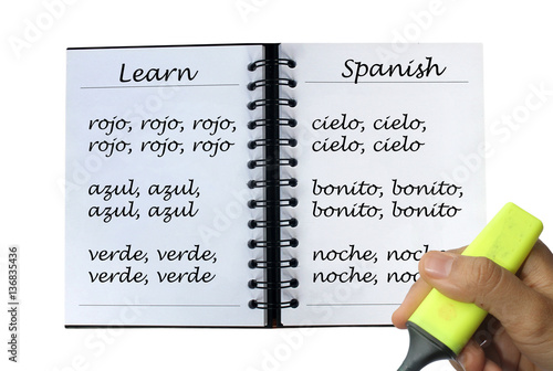 Learn spanish concept - repeated simple english words in noteboo photo