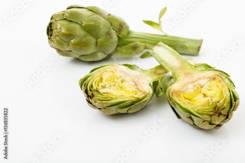 Fresh artichokes isolated on white background