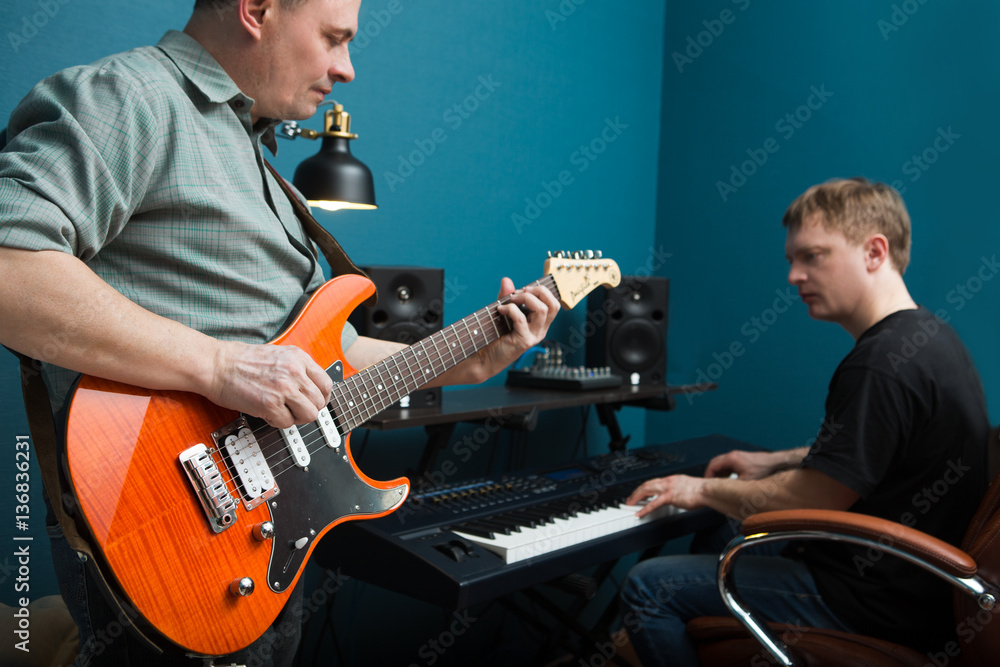 Obraz premium Music rock Band Rehearsal Friendship Together. the baby on a fat
