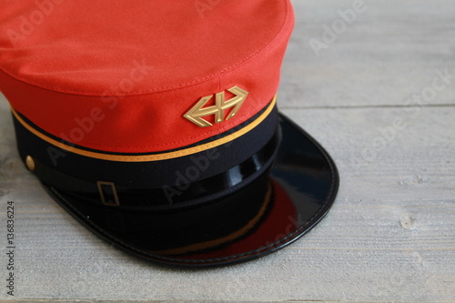 Swiss railway hat used until 1994 on wood background