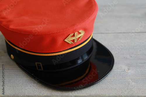 Swiss railway hat used until 1994 on wood background