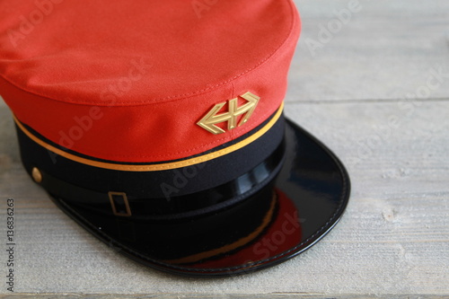 Swiss railway hat used until 1994 on wood background