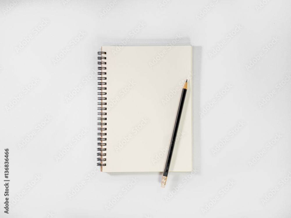 Top view open notebook and pencil potted on white background. Top view open notebook and pencil potted on white background.