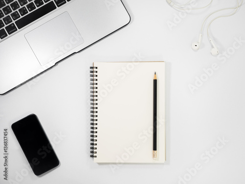 White office desk table with a lot of things. Top view with copy