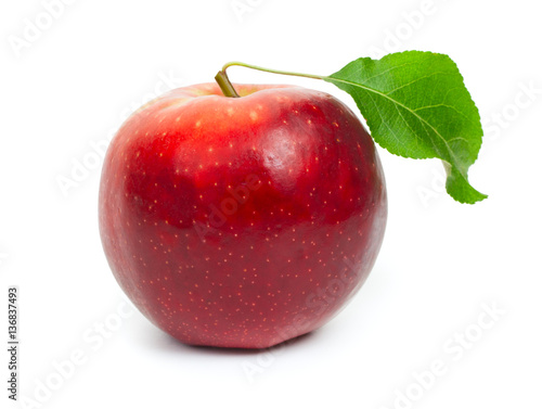 Red apple isolated on a white background, close-up.