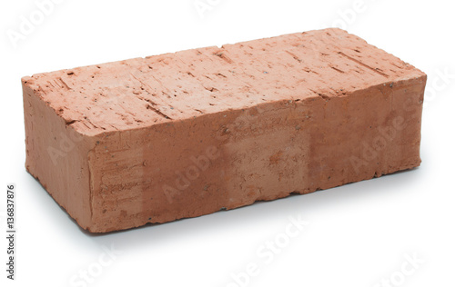 New single unused red brick isolated on white background photo