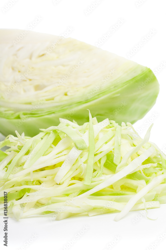 Fresh sliced green cabbage isolated isolated on a white backgrou Fresh sliced green cabbage isolated isolated on a white backgrou