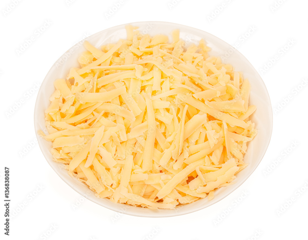 Bowl of grated cheese isolated on white background. close up