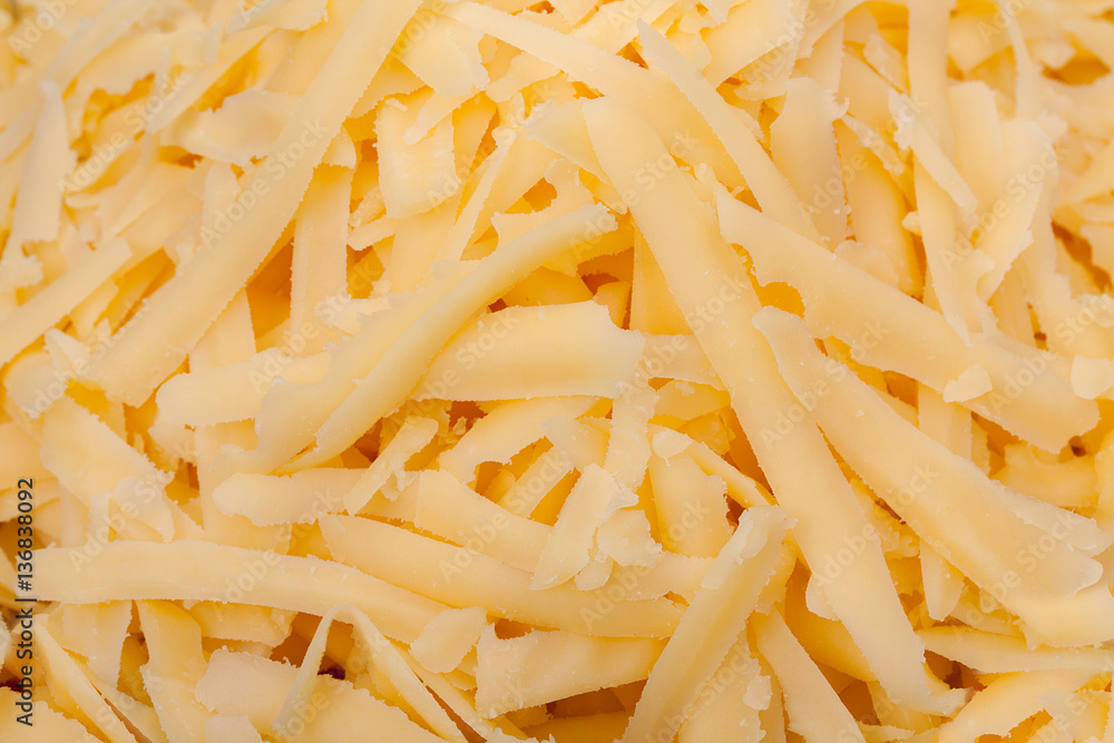 Grated cheese background. Close up, top view. Grated cheese background. Close up, top view.