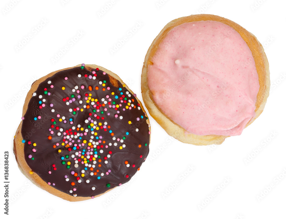 Donuts with chocolate icing and sprinkles. Donut with cherry jam Donuts with chocolate icing and sprinkles. Donut with cherry jam