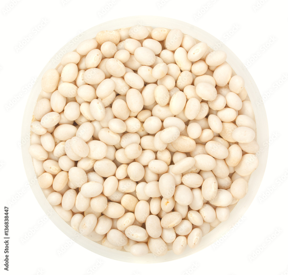 White beans in round plate isolated on a white background top vi White beans in round plate isolated on a white background top vi