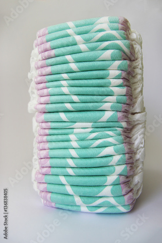 Diapers stacked in a piles