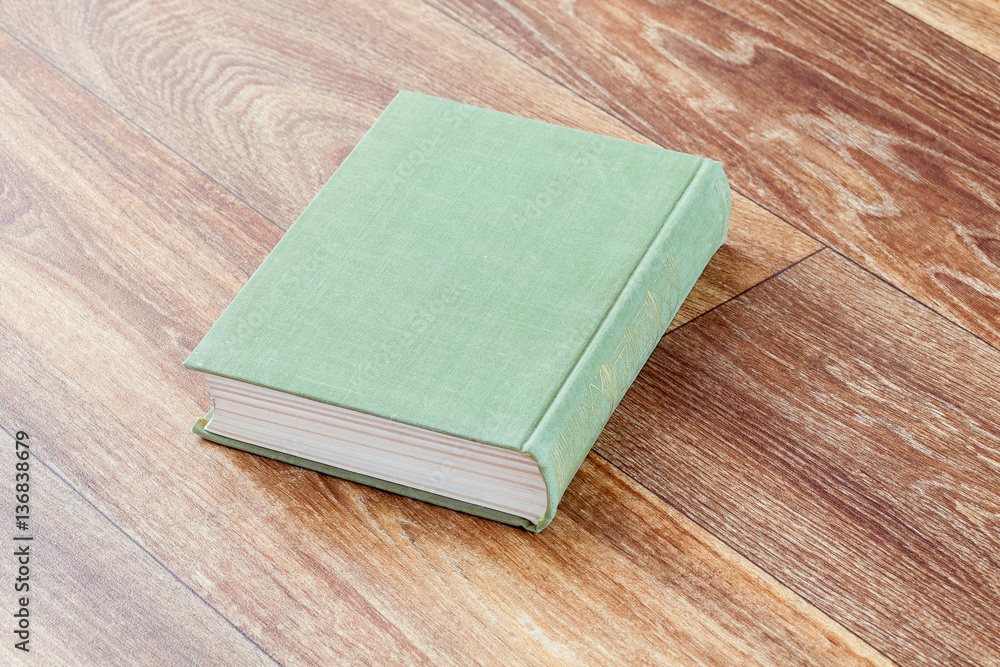 Fototapeta premium The book olive colour in a firm cover.