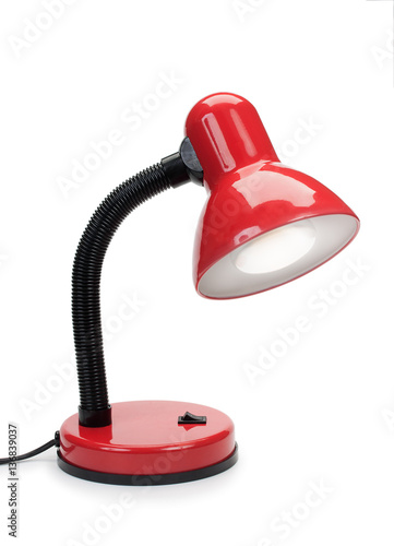 Turned on, lighting modern red desk lamp with gooseneck isolated photo