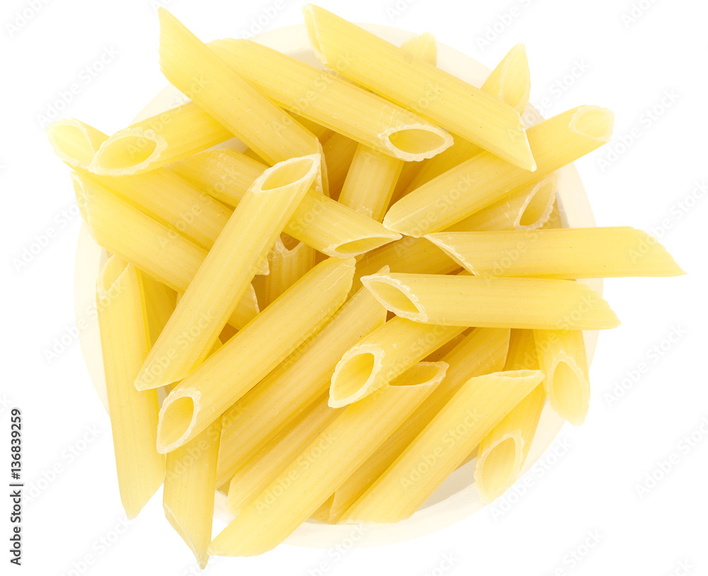 Pasta noodles in round plate isolated on a white close up top vi Pasta noodles in round plate isolated on a white close up top vi