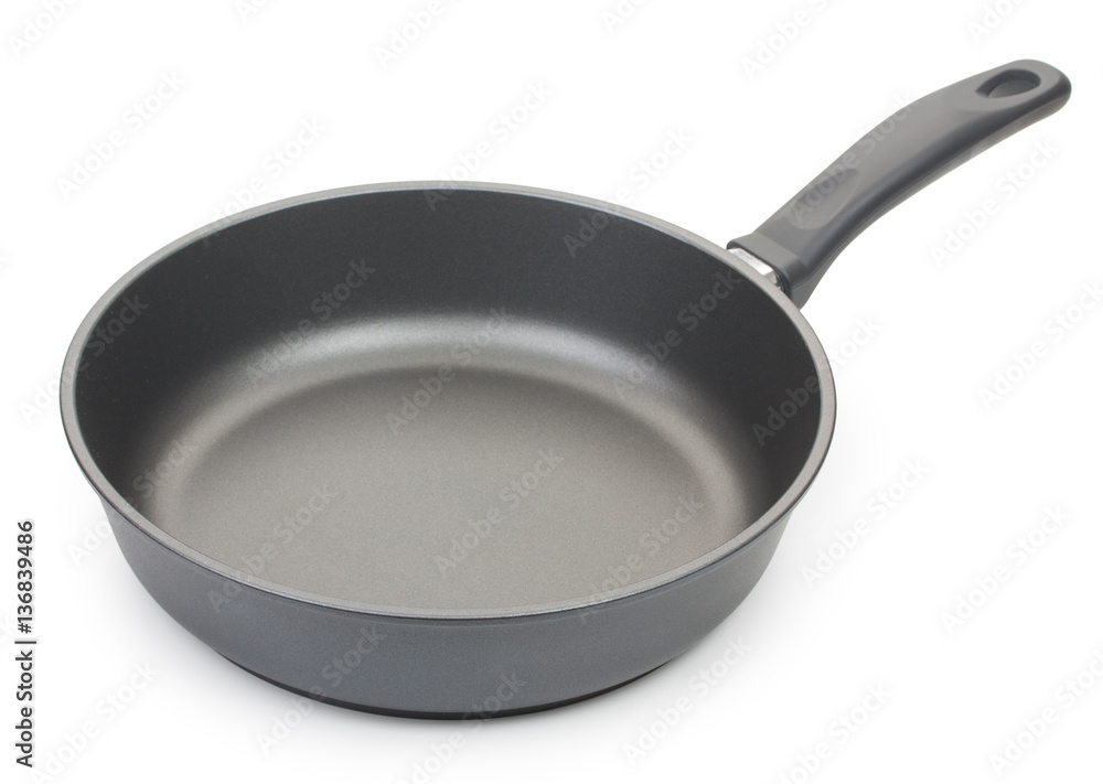Black frying pan isolated on white background, close-up. Black frying pan isolated on white background, close-up.