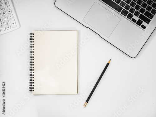 White office desk table with a lot of things. Top view with copy