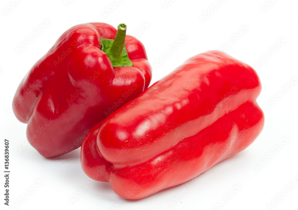 Pair fresh red bell pepper, isolated on white background, close- Pair fresh red bell pepper, isolated on white background, close-