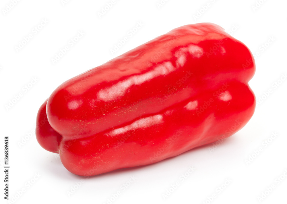 One fresh red bell pepper, isolated on white background, close-u One fresh red bell pepper, isolated on white background, close-u