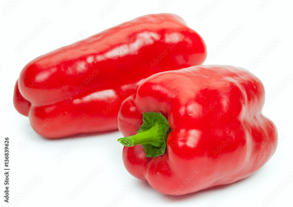 Pair fresh red bell pepper, isolated on white background, close- Pair fresh red bell pepper, isolated on white background, close-