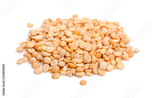Heap of yellow dried peas isolated on white background