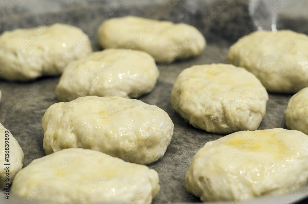 the dough on a baking sheet for baking the dough on a baking sheet for baking