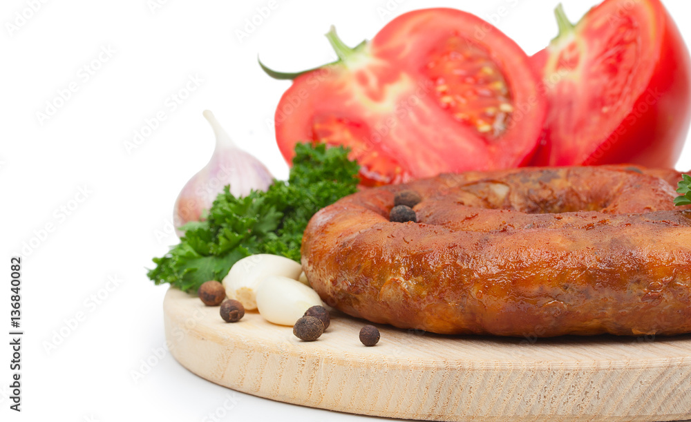 Homemade Sausage on a cutting board with fresh tomatoes, spices, Homemade Sausage on a cutting board with fresh tomatoes, spices,