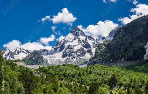 Mt. Dzhan-Tugan with the forest at the foot of it. Adyl-Su gorge, Kabardino-Balkaria, Russia.